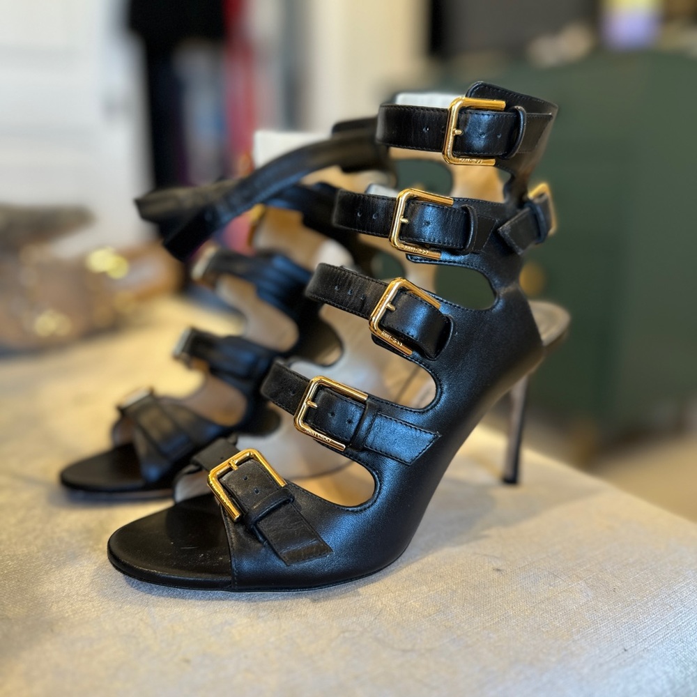 Jimmy Choo 36.5 black strappy heels with gold buckles. Worn (1) time.